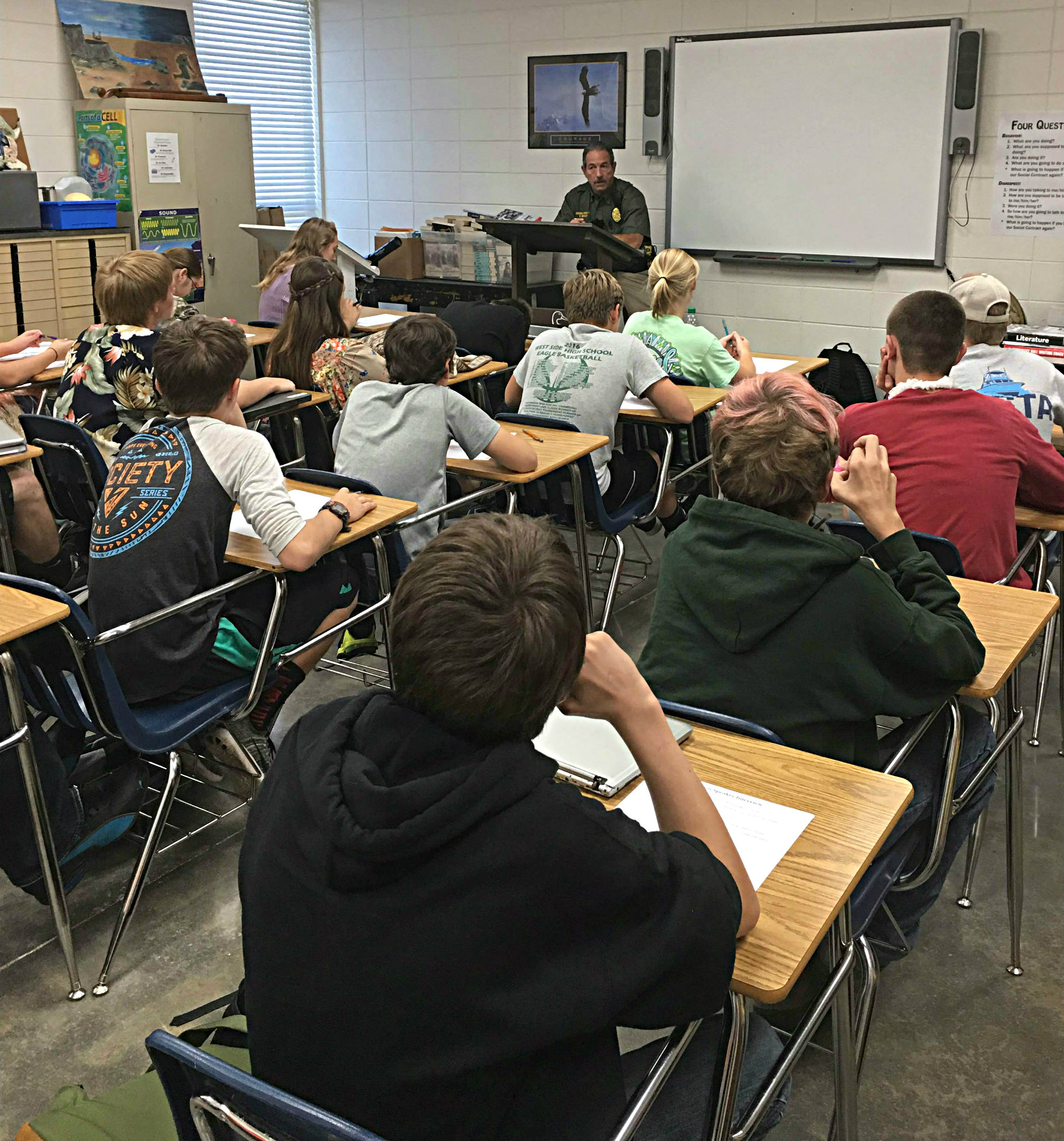Local officer talks to 8th graders